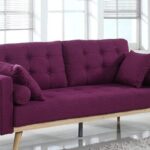 Purple Colored Sofa Placed On Modern Living Room.
